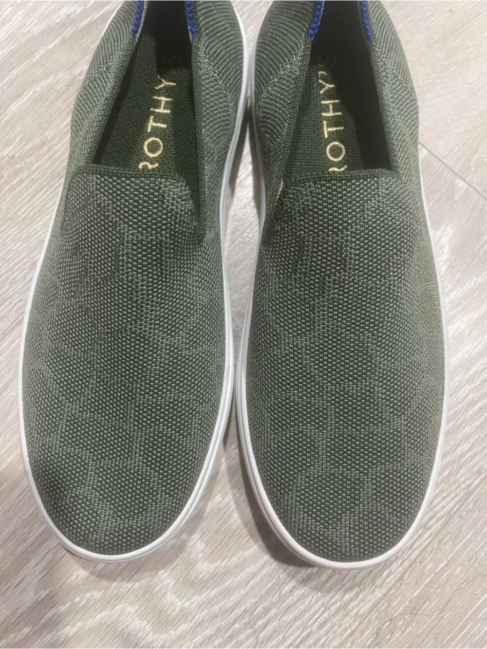 Rothy's Safari Green size 7 woman's Slip-On  sneakers with White Sole